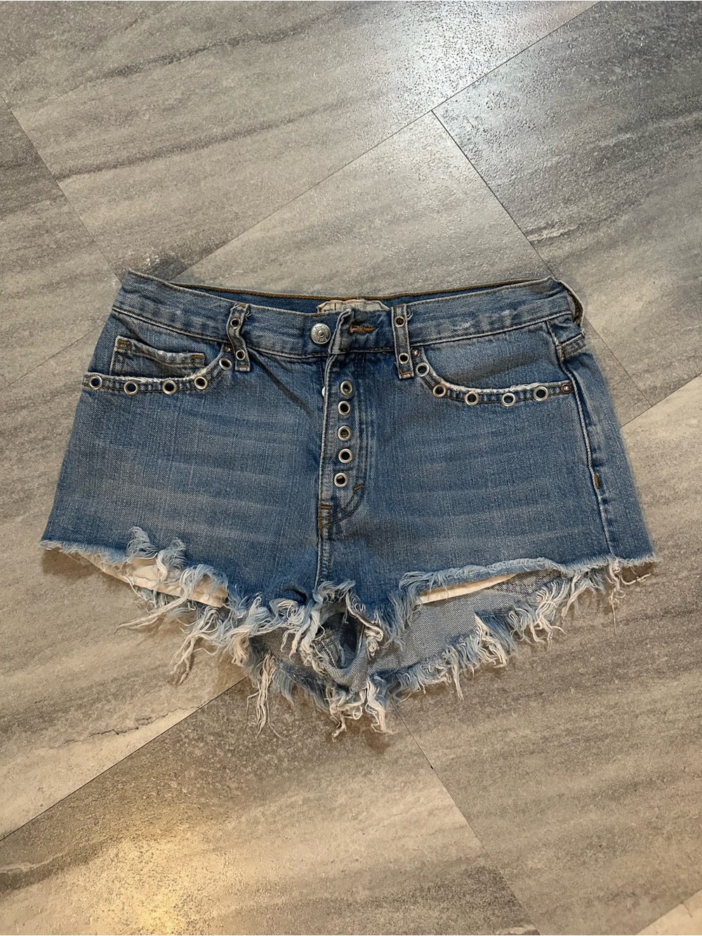 Free People Barcelona Nights grommet cutoff denim shorts